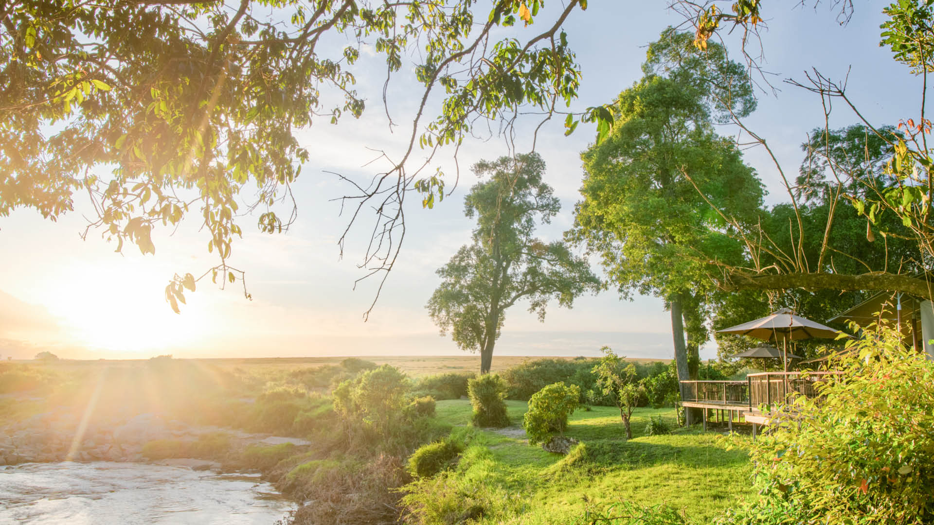 The deck area at Rekero overlooking the river bend at sunset