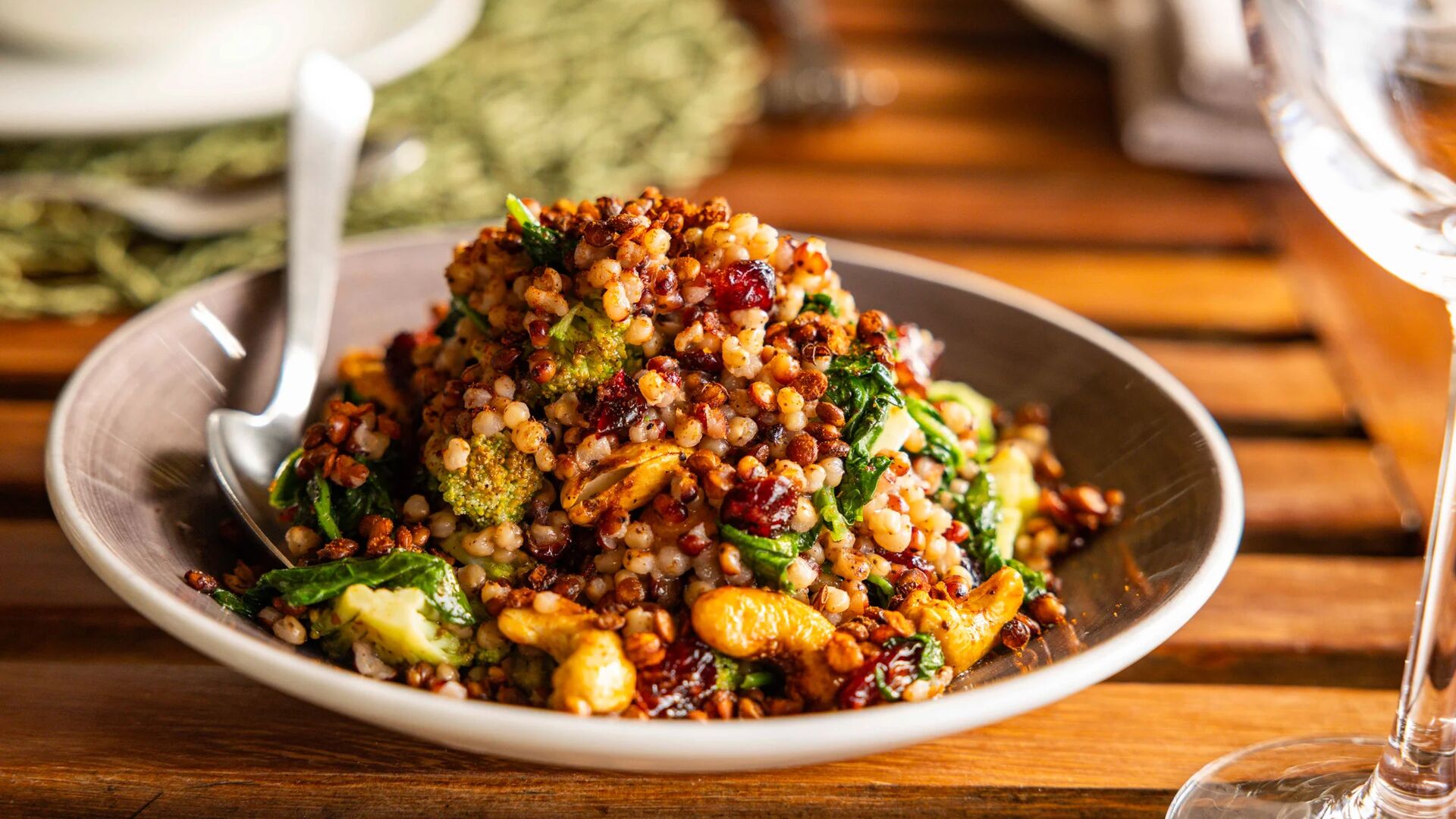 a bowl of vegetable cous cous salad