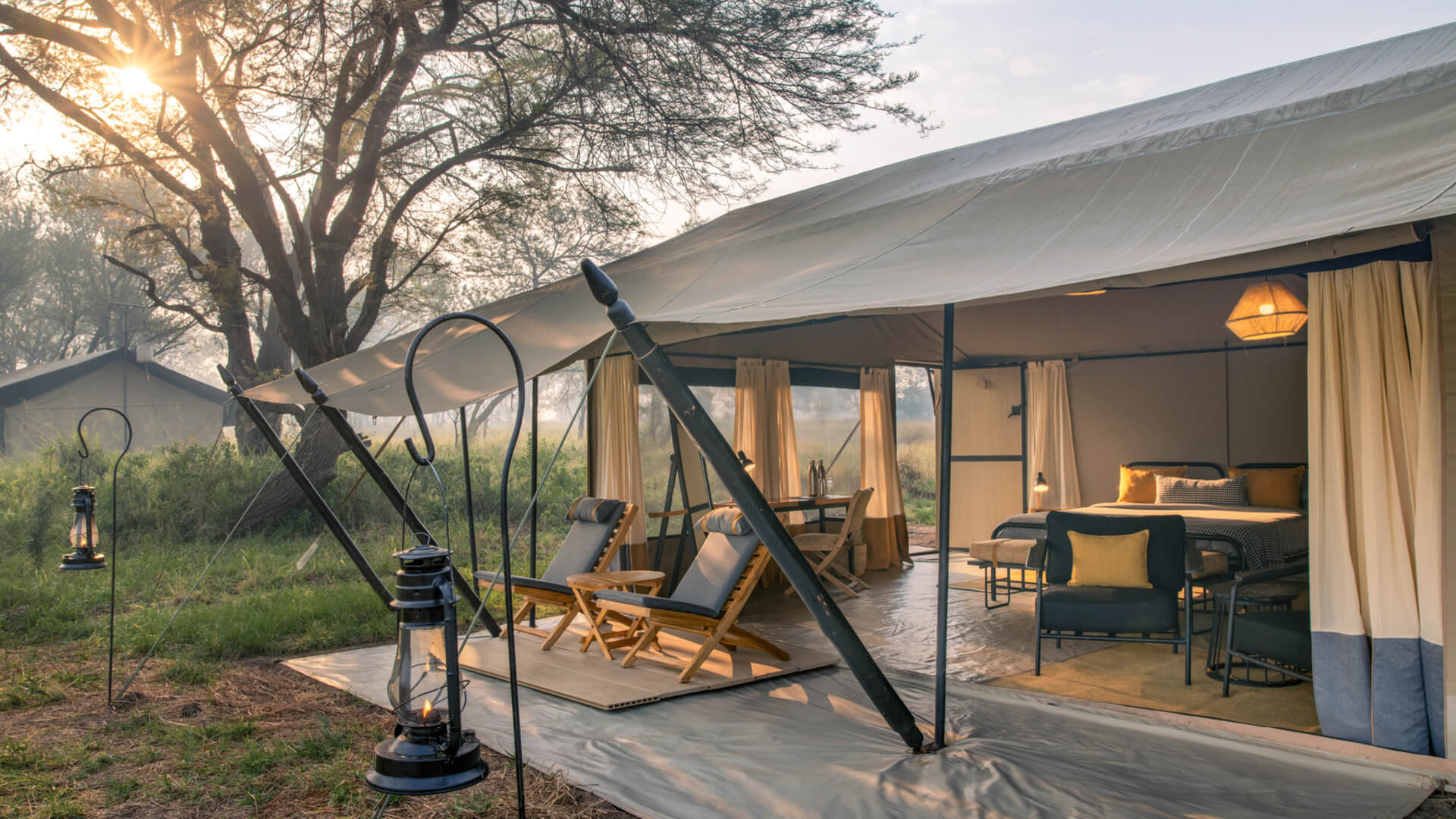 The deck area of a guest tent at Ubuntu Migration Camp