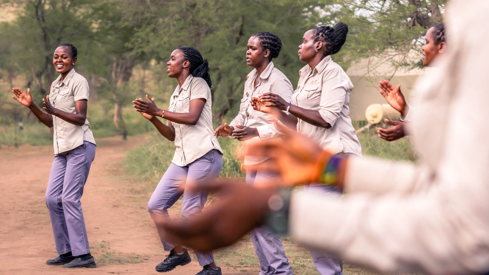 Staff dancing at Dunia Camp, Serengeti, Tanzania