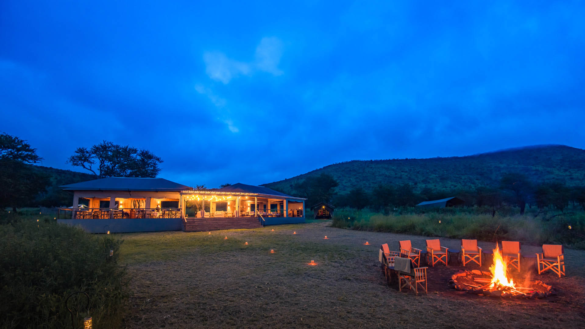 Outside view of Dunia Camp main area and campfire, Serengeti National Park