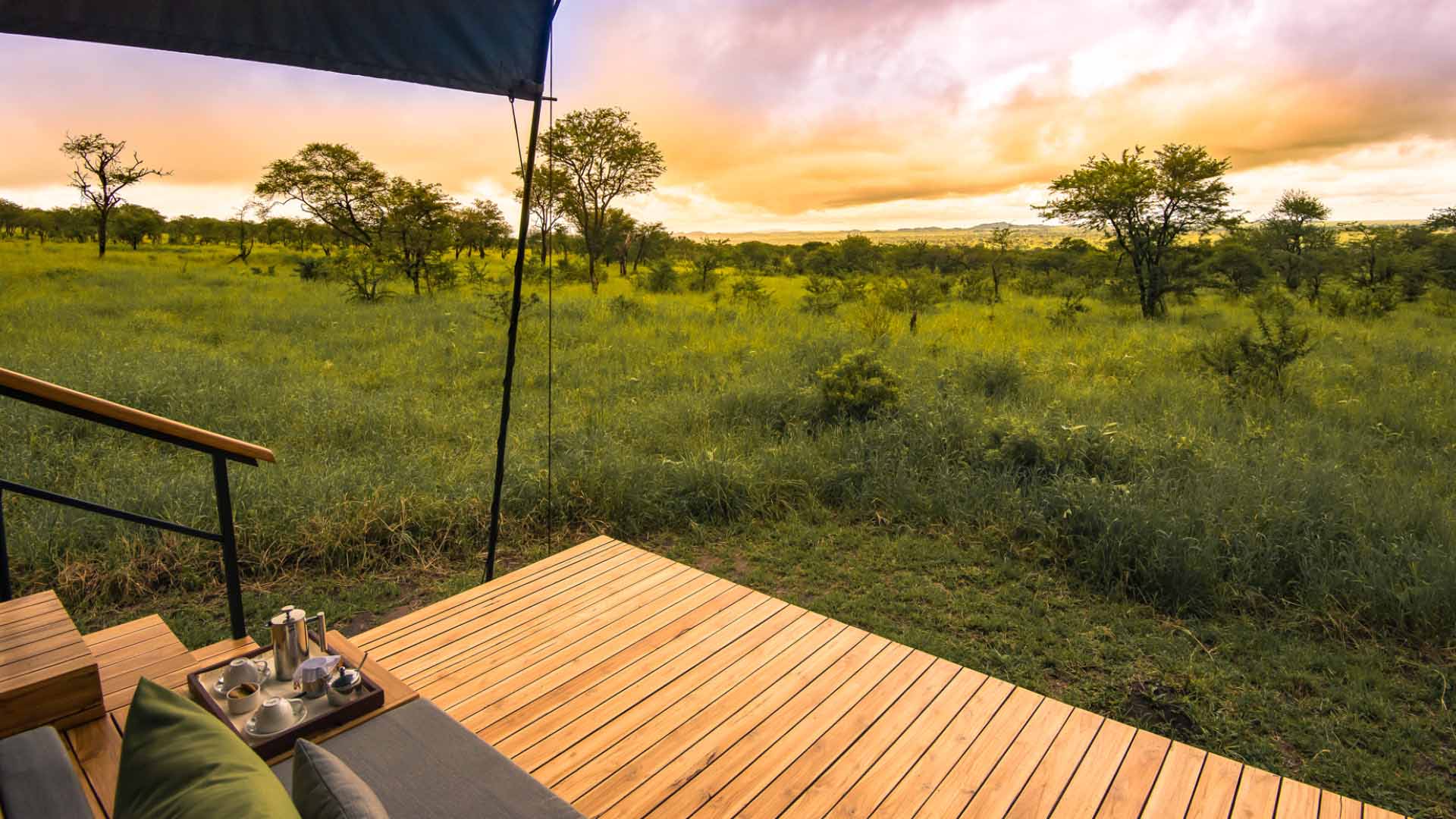 Sunrise view from the guest tent deck at Dunia Camp in Serengeti National Park