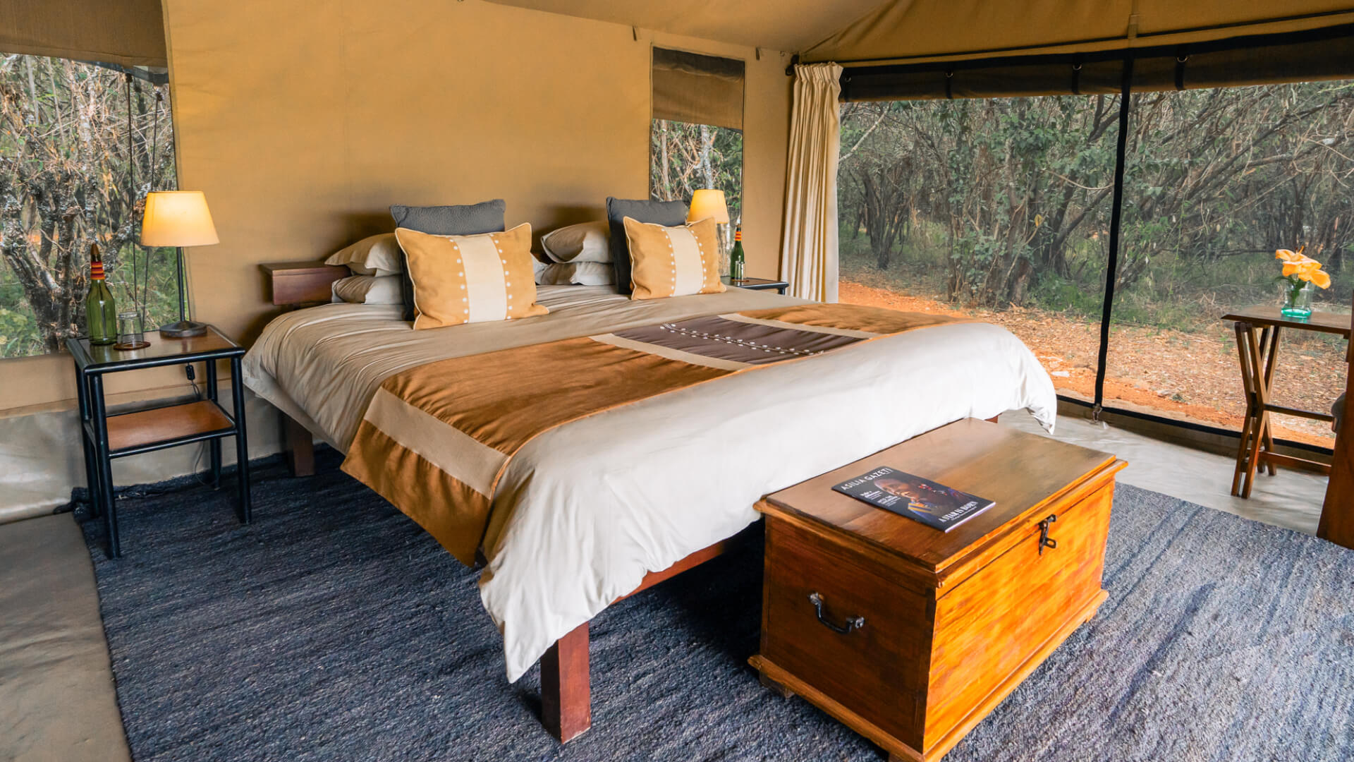 Large bed in guest tent bedroom, Encounter Mara Camp, mara naboisho conservancy, kenya