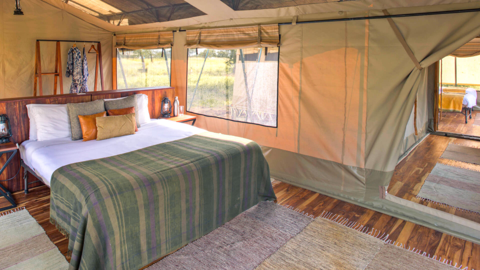Inside view of bed in guest tent, olakira migration camp, Serengeti National Park, Tanzania