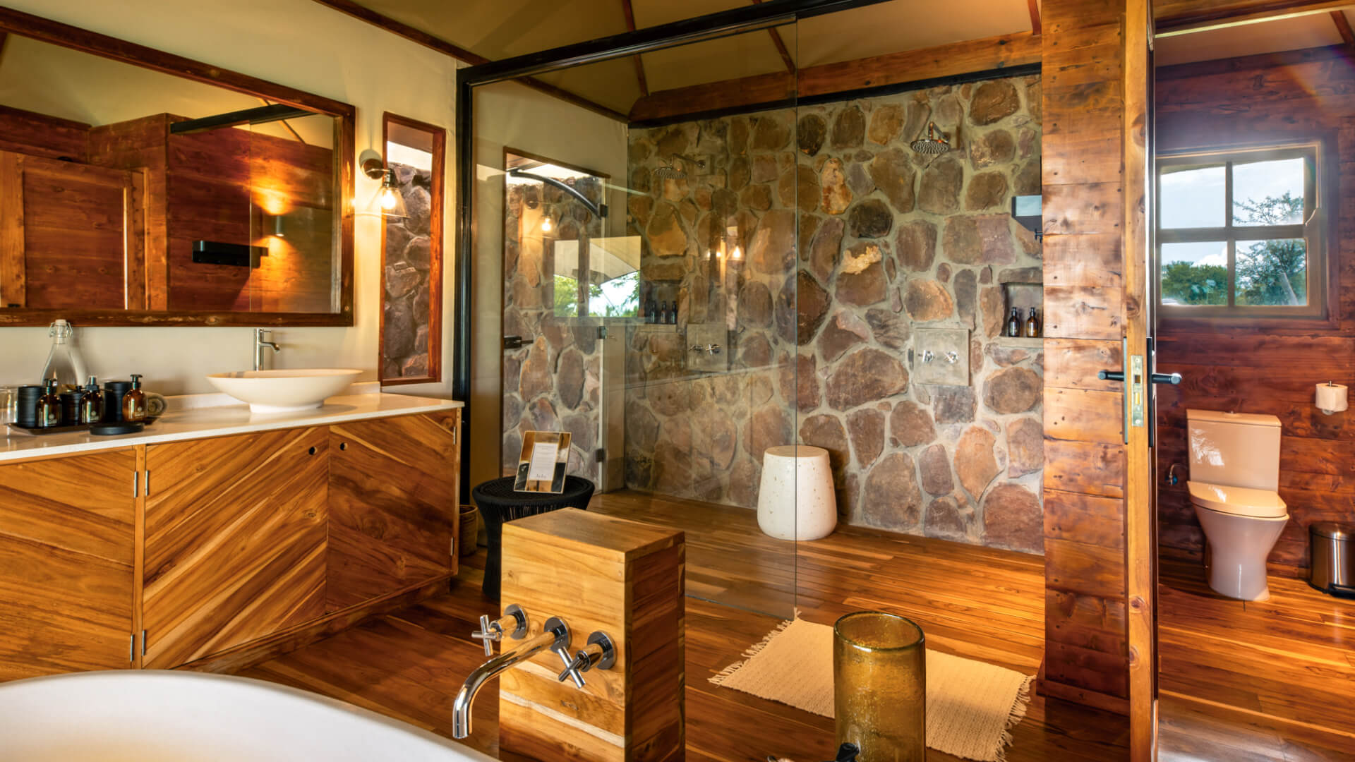Sayari Retreat, Serengeti National Park, guest bathroom double shower with glass door