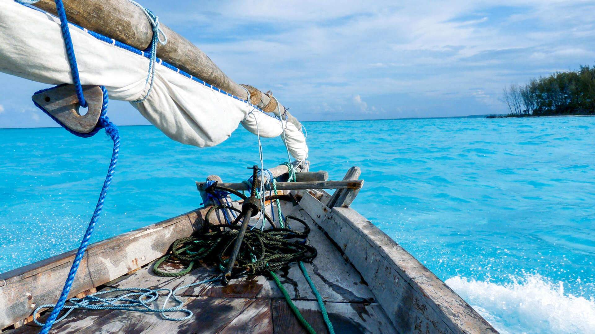 A view from a boat on the crystal blue water in zanzibar