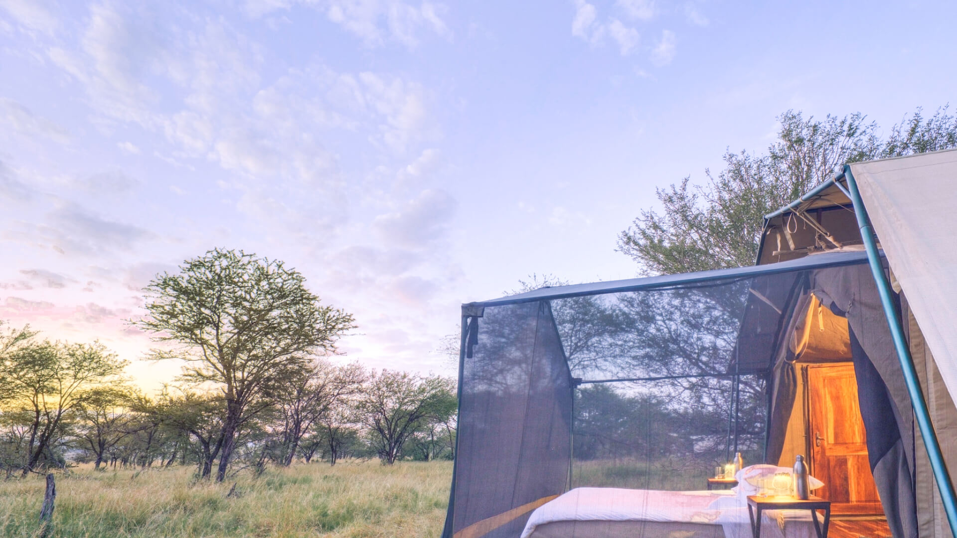 The mosquito net over your bed at Olakira - sleeping beneath the stars