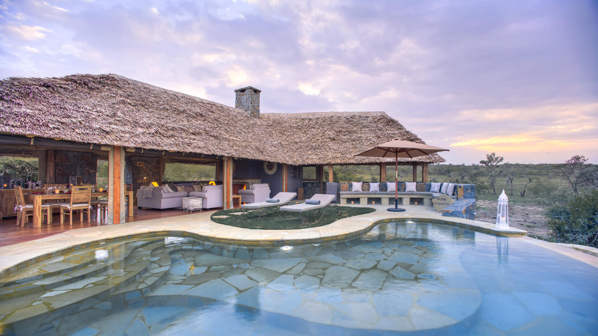 The swimming pool and poolside lounge and bar at Naboisho Camp, Mara Naboisho Conservancy