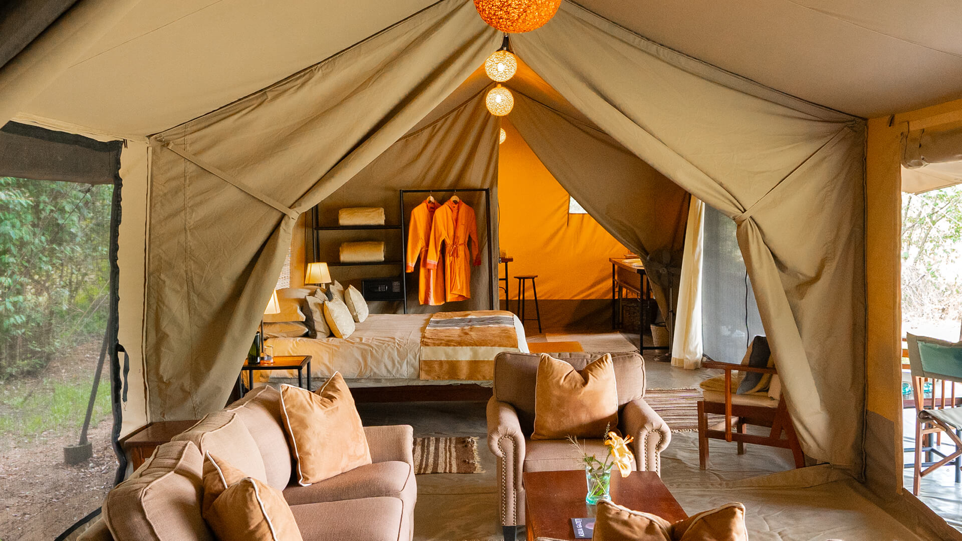 An authentic tented safari camp bedroom interior