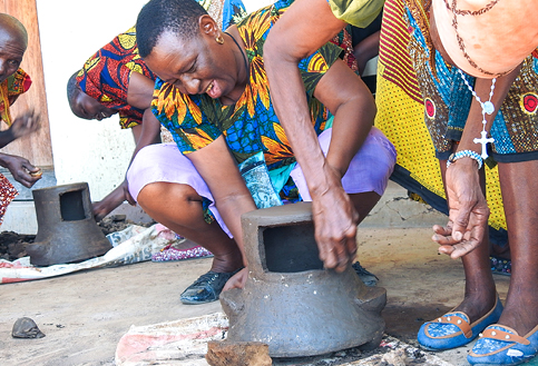 People making clay pots for MCCT in East Africa