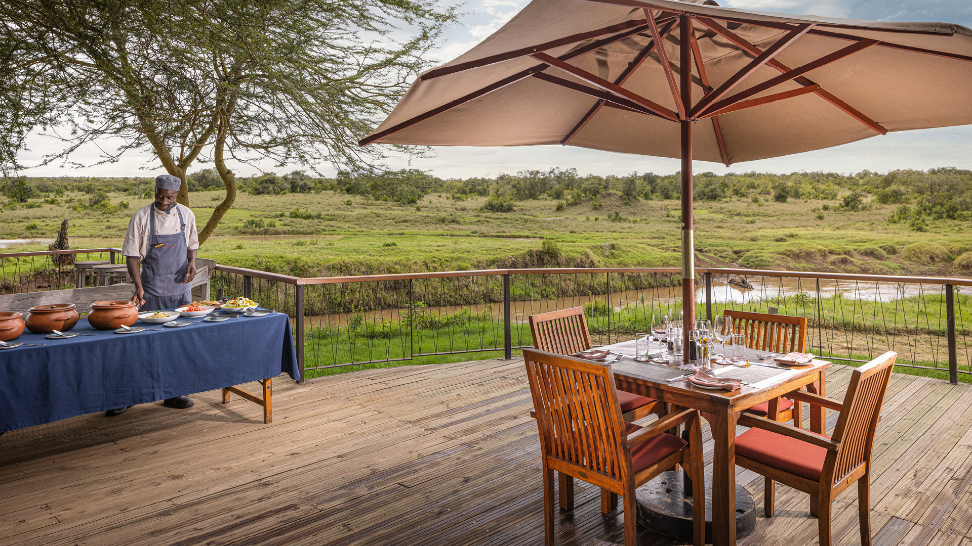 view out from the deck at lunchtime in ol pejeta bush camp kenya east africa, asilia africa