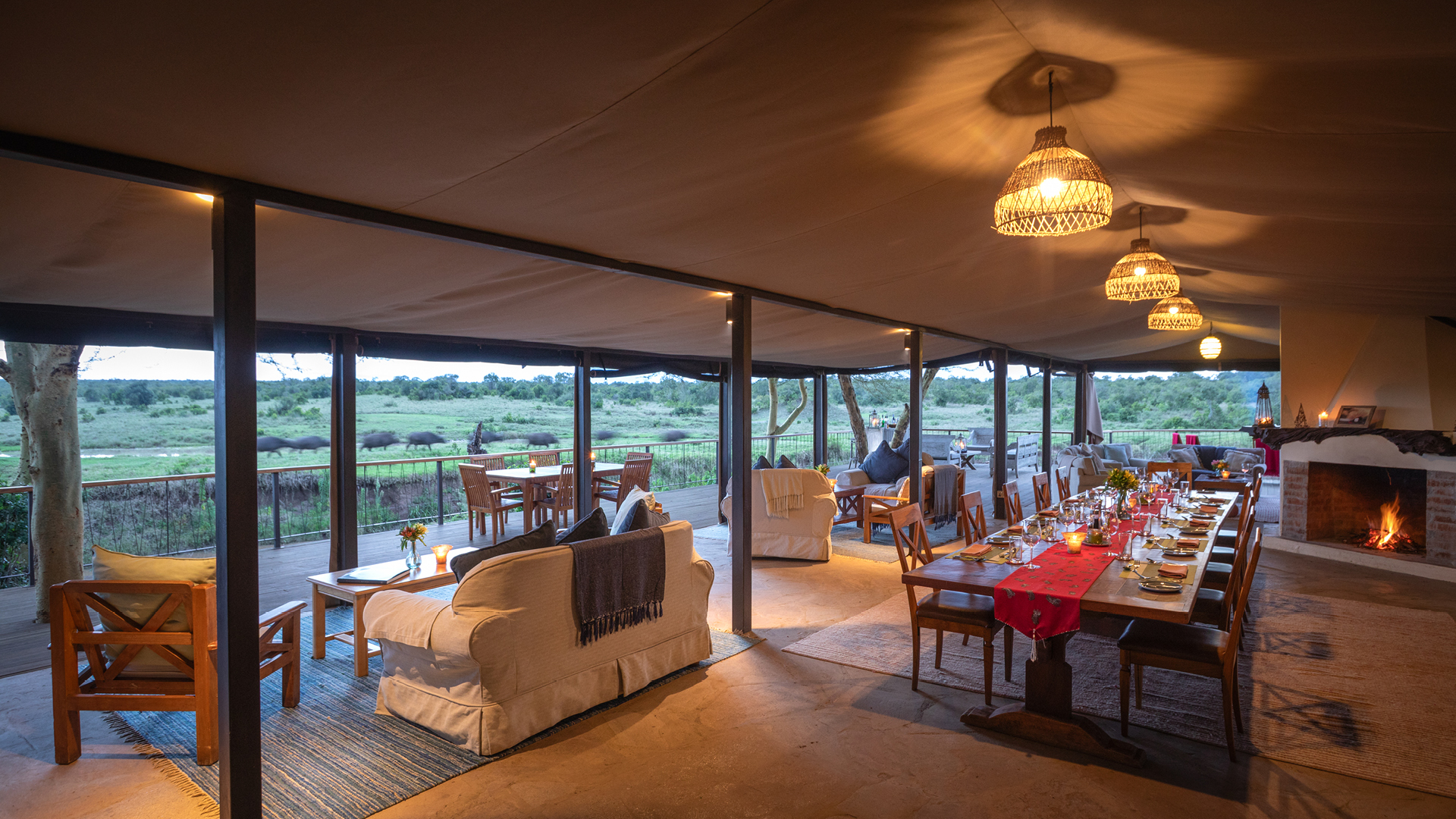 a view out from the lounge area at ol pejeta bush camp in kenya, asilia africa
