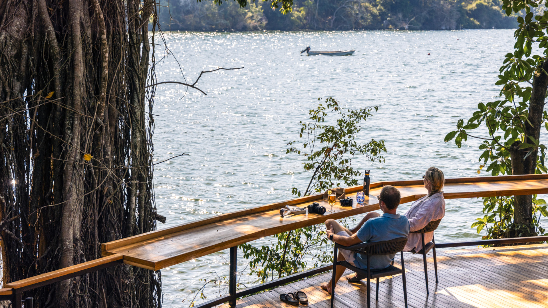 Lake Victoria, couple, boat, drinks on the deck