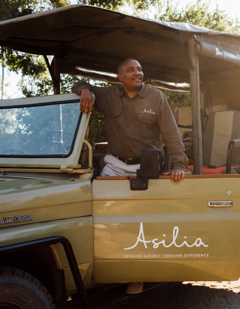 David, posing in a safari vehicle in Ruaha National Park, southern Tanzania.