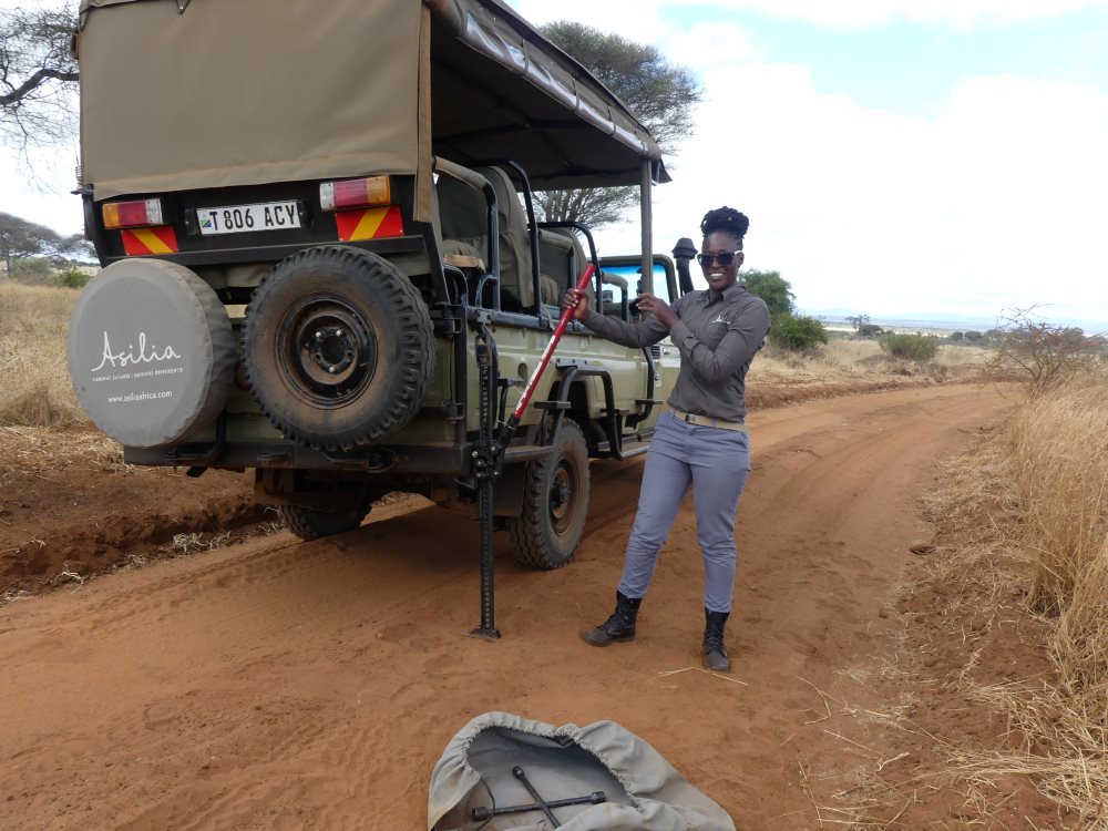 Grace demonstrates the correct use of the high lift jack, Tarangire National Park.