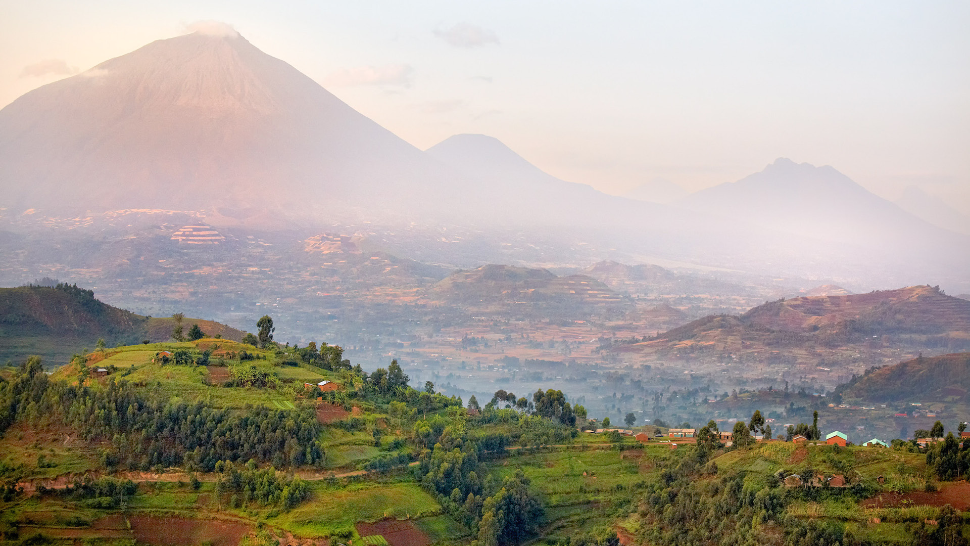 view of virunga volcanoes and mgahinga gorilla national park from kisoro
