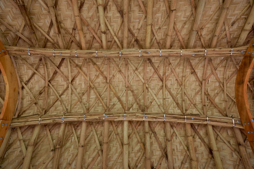 The interior of the roof is visually striking with the beautiful woven patterns.