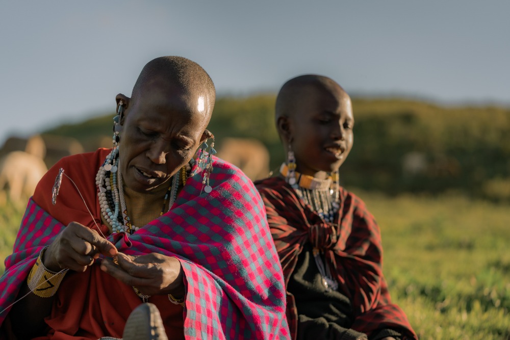 A Maasai creating traditional beadwork, Ngorongoro Conservation Area, Tanzania