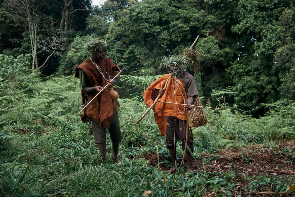 Batwa members re-enacting the hunt, Bwindi Forest, Uganda